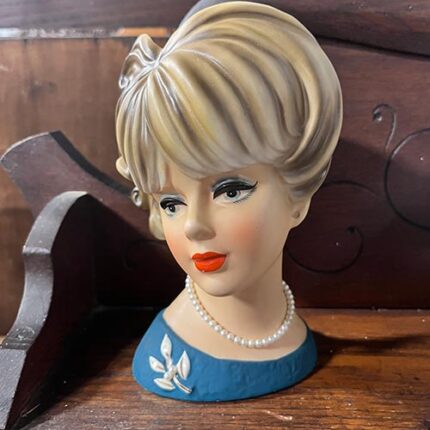 This is a vintage Napcoware Lady Head Vase