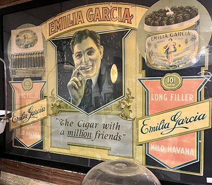 This is a Emilia Garcia Cigar Advertising Display Sign