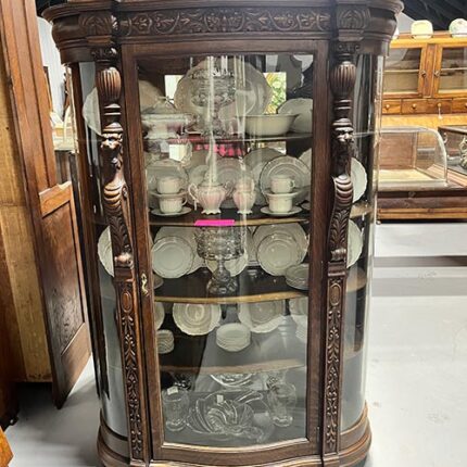 This is a antique Victorian style curio cabinet